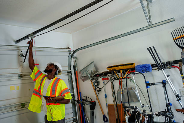 Professional Garage Door Maintenance technician working in Centuria, WI